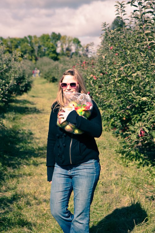 Julia Miller picking apples at the Afton Apple Orchard